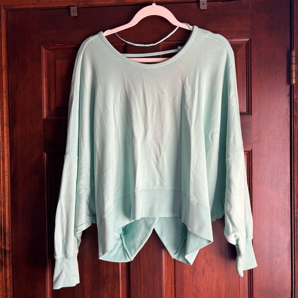 Free People mint green slouchy, backless Sweatshirt. Size XS
